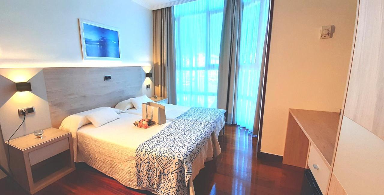 Hotel Nueva Plaza มาลีอันโย ภายนอก รูปภาพ