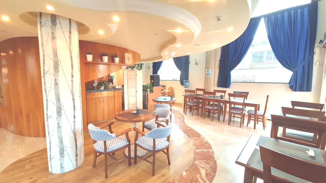 Hotel Nueva Plaza มาลีอันโย ภายนอก รูปภาพ